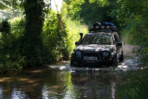 Looks like crossing a river in the middle of the Jungle but this is really in England.