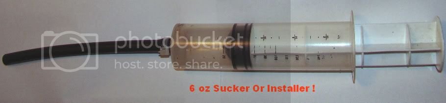 VeterinarianOilSyringe.jpg