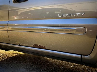Jeep Liberty Rusty Door.jpg