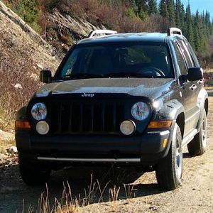 Halfway up Mt Ann, BC interior.  GPS said 6300ft ASL.  Stopped at a clearing on the logging road to gawk at the mountains.  KJ was totally stock at th