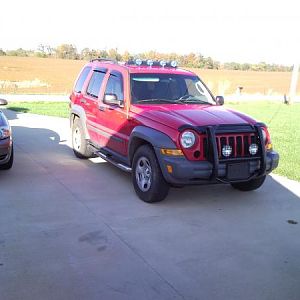 Pre-lift, showing the added light bar and brush guard.