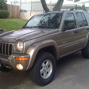 my liberty with new tires and a 2" lift