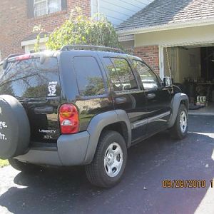 My first Jeep gift from my guy....   Spare Tire Cover~