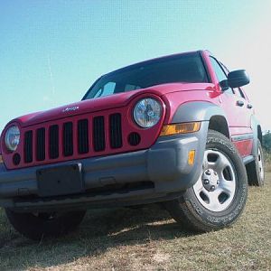 Stock Jeep KJ.  This picture was taken right after I bought it and immediately found a trail!