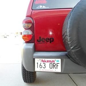 Changed the old chrome emblems to slightly oversized and black.  Added the oversized black "Jeep" and the smaller "Liberty" tag and removed the "4X4"