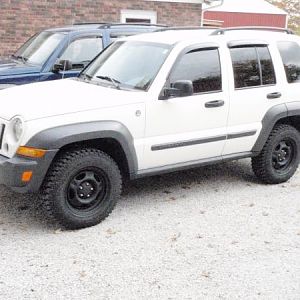 New tires GY Wrangler Authority and stock painted rims