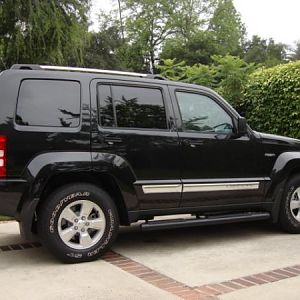 2012 Jeep Liberty Ltd Jet Edition--note Mopar side steps/ tow hitch/front and rear  mud flaps.