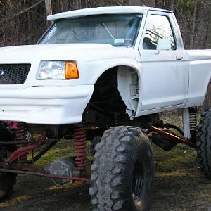 88 Ranger / 02 Edge Pre Runner body kit. 60s, Locked, 5.38s, 4 link / 3 link,  full cage, backhalfed, open bed containing radiator and fuel cell, etc.