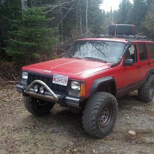 1997 jeep cherokee sport I custum built a 6in suspension lift for it with a full roll cage and a snorkel. Eran 33in 12 plie tires with 5 psi in them g