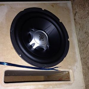 10" JBL GT sub
Custom built ported box
(Has since been "rhino-lined")