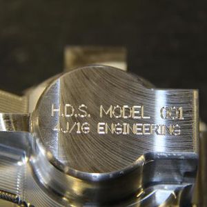 IMG 1334

BOTTOM OF THERMOSTAT HOUSING ENGRAVED WITH, (FIRST LINE), "H.D.S. MODEL 001".  H.D.S. STANDS FOR HOT DIESEL SOLUTIONS.  (SECOND LINE) "4J/