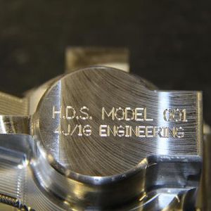 IMG 1334

BOTTOM OF THERMOSTAT HOUSING ENGRAVED WITH, (FIRST LINE), "H.D.S. MODEL 001".  H.D.S. STANDS FOR HOT DIESEL SOLUTIONS.  (SECOND LINE) "4J/