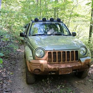 After going down a 45 degree slick hill into a mud hole that required an immediate 90 degree left turn.  The Isuzu trooper in front of me ended up bac