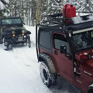 Waiting for the TJ to try and winch up the hill.