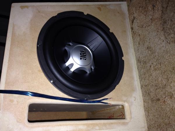 10" JBL GT sub
Custom built ported box
(Has since been "rhino-lined")