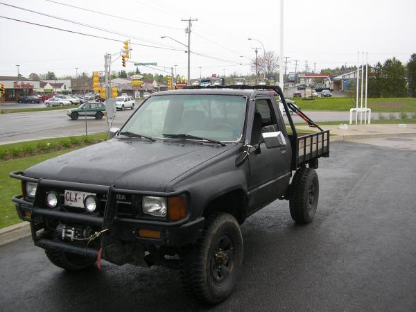 1988 toyota I built the flat bed and the winch mount redid all the suspension and custom built the snorkel it was by far on of my favorite 4x4s I've e