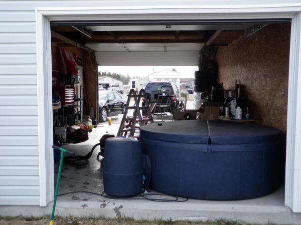 2 garage doors, 1 hot tub.