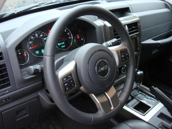 2012 Jeep Liberty Ltd Jet Edition with Dark Slate Leather and silver-grey woodgrain interior.