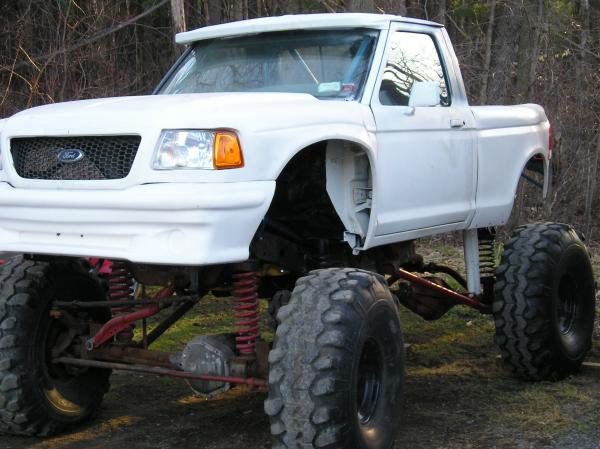 88 Ranger / 02 Edge Pre Runner body kit. 60s, Locked, 5.38s, 4 link / 3 link,  full cage, backhalfed, open bed containing radiator and fuel cell, etc.