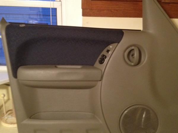 added matching fabric to the door panels. after a couple months it started to peel and got very faded from my elbow always resting on it