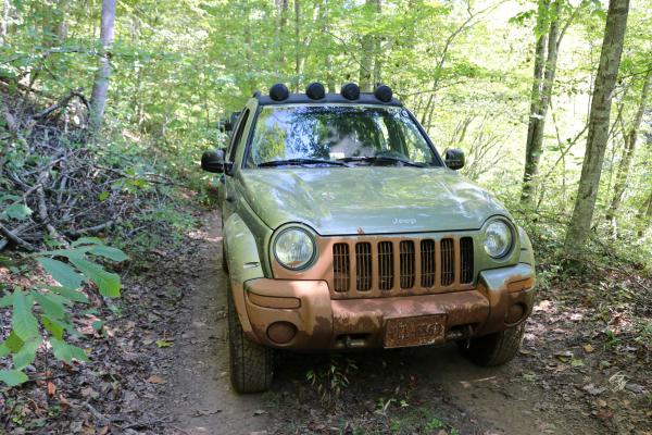 After going down a 45 degree slick hill into a mud hole that required an immediate 90 degree left turn.  The Isuzu trooper in front of me ended up bac