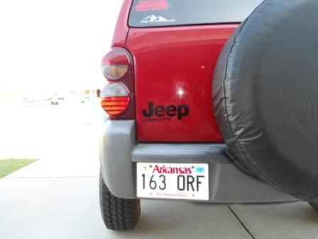 Changed the old chrome emblems to slightly oversized and black.  Added the oversized black "Jeep" and the smaller "Liberty" tag and removed the "4X4"