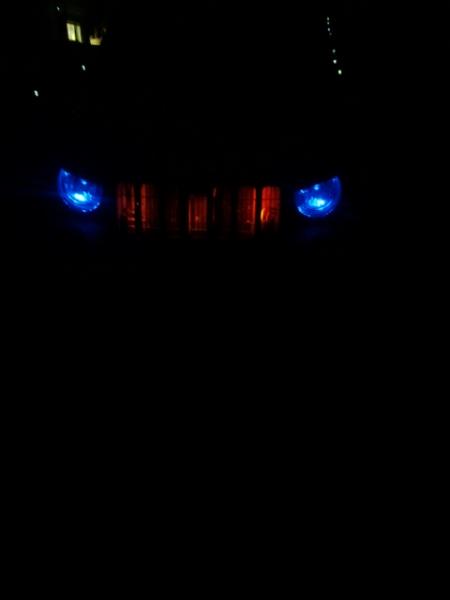 costom head lights i made blue led's and also million color ledglow lights in grill along with eye brows