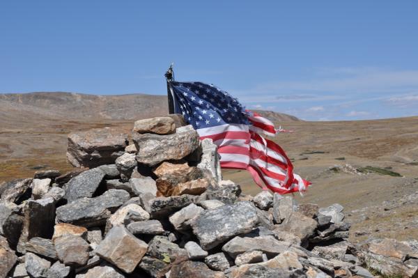 Kingston Peak Trail 9.16.12 Flag on top of the "rock house" on top of the peak. (you bring your own rock and stack it on the house for luck?)