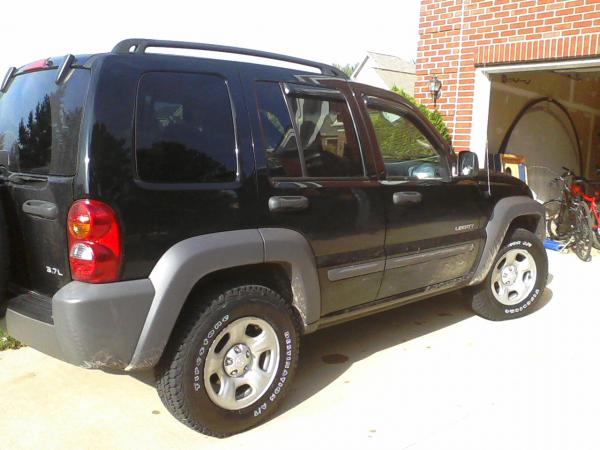 my baby with her new tires. i think this is the most flattering view of a kj.