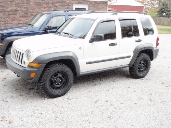 New tires GY Wrangler Authority and stock painted rims