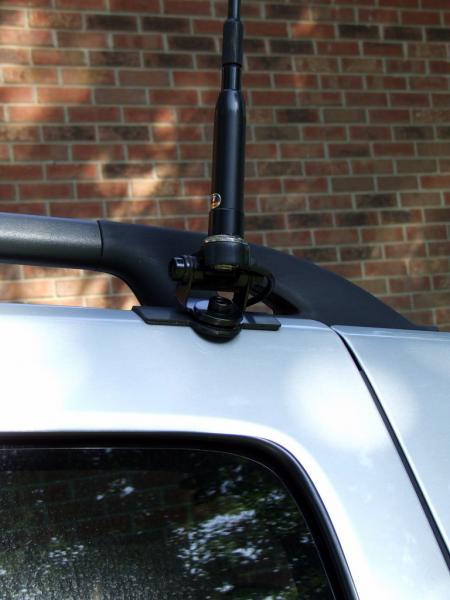 Opek antenna mount (from Triad Electronic Supply in Winston-Salem, NC) on the right side passenger door. Antenna is a Comet SBB-7.