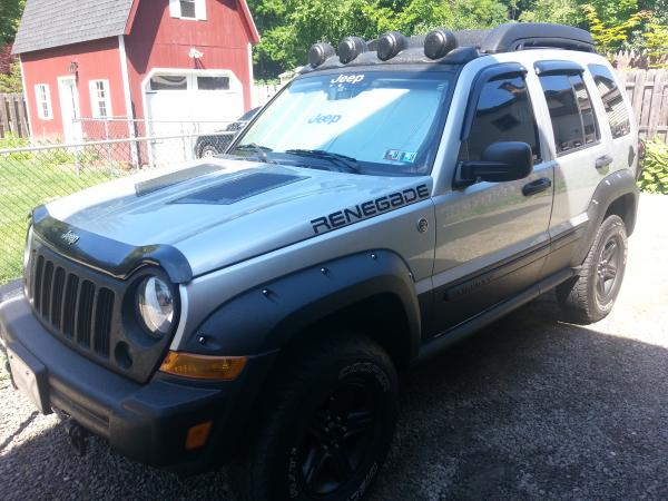 Recently herculined bumpers, fender flares, lightbar, roof and roof rack.