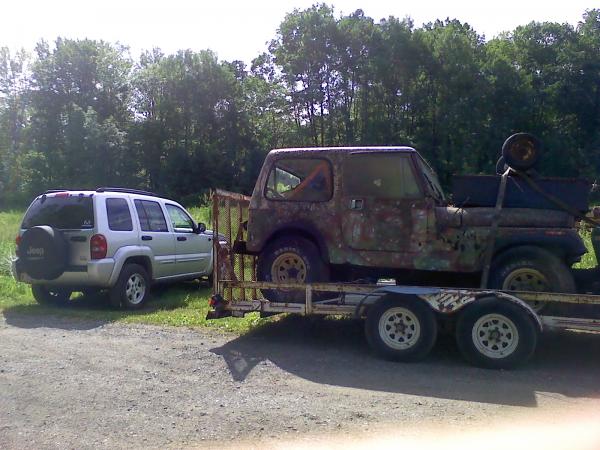 scrapping an old CJ7 today. The KJ grabbed a quick photo-bomb ;-)