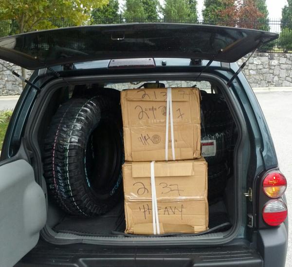 The Jeep all packed up with new wheels and tires.