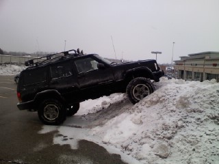 The jeep playing in the snow!