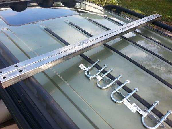 The new mopar cross bars..lol.. mopar is now selling thule bars that sit up very high and look silly..old style is gone.. so made my own. Saved 200.00