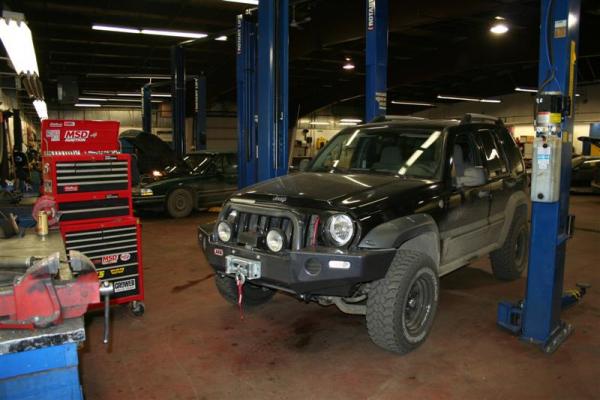 This is where I work on my KJ.  I volunteer my time at a community car club that is VERY well equiped.  They let me keep my toolbox there and they gav